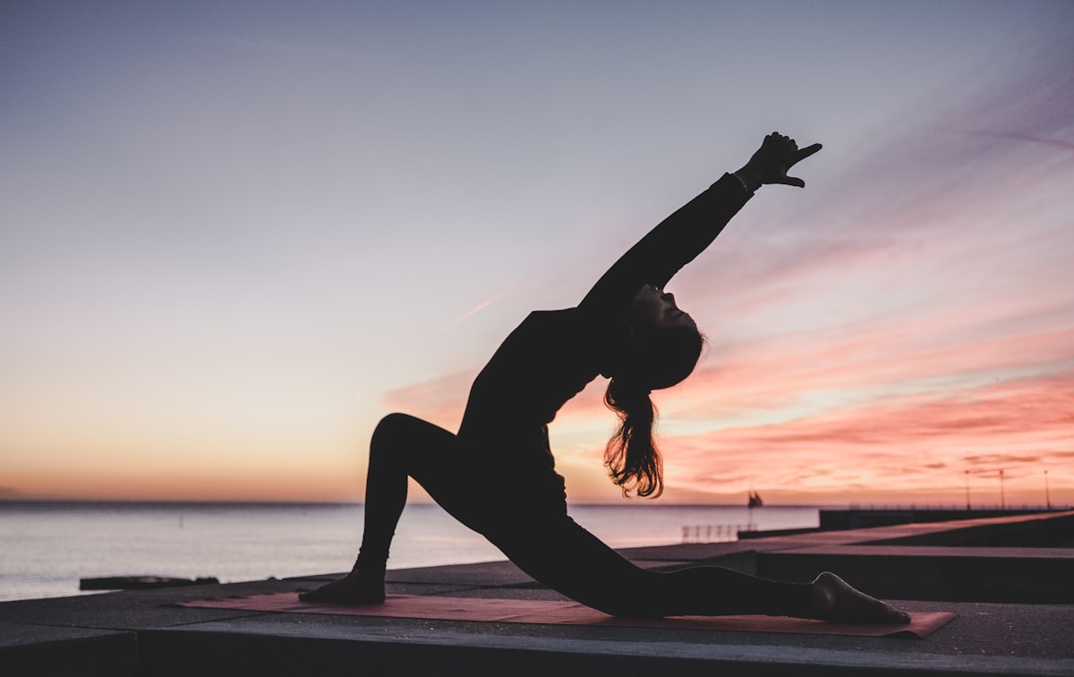 Morning balance practice on a soft cushion in a bright living room